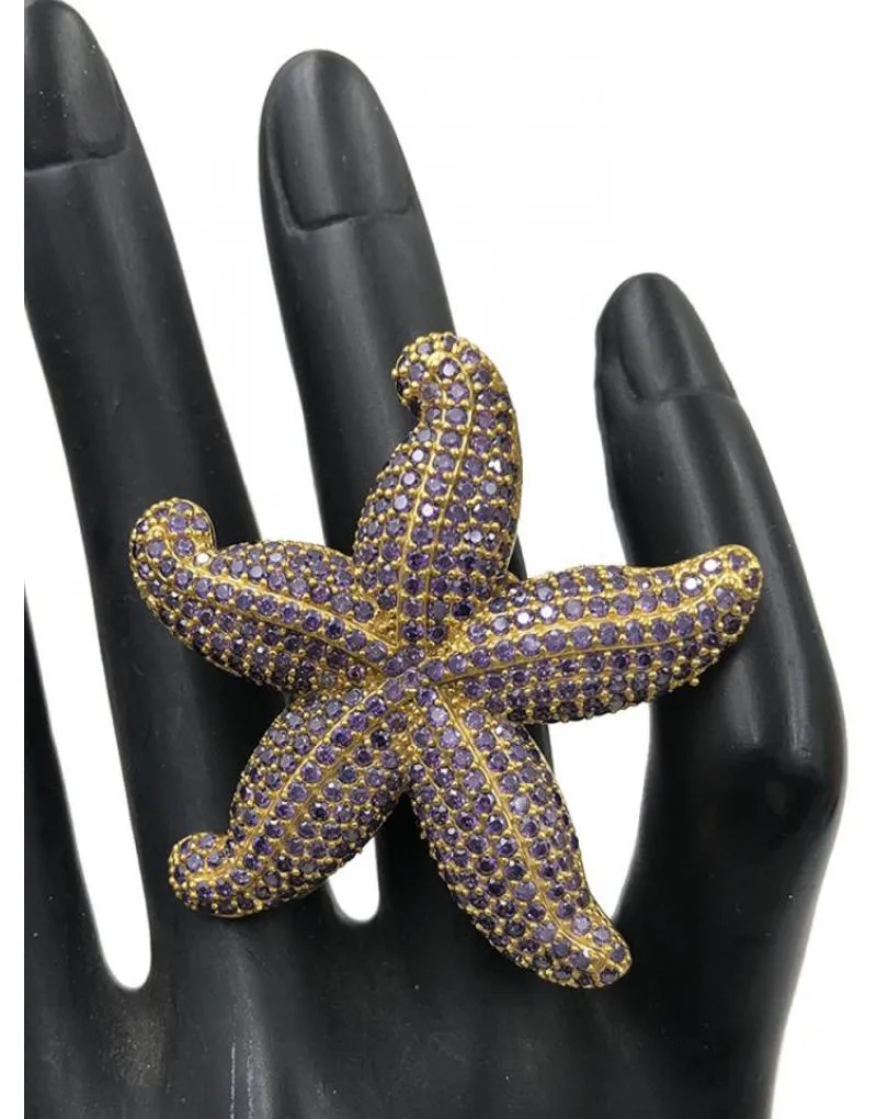 ANILLOS MORADOS DE ESTRELLA DE MAR DECORADA CON PEDRERIA