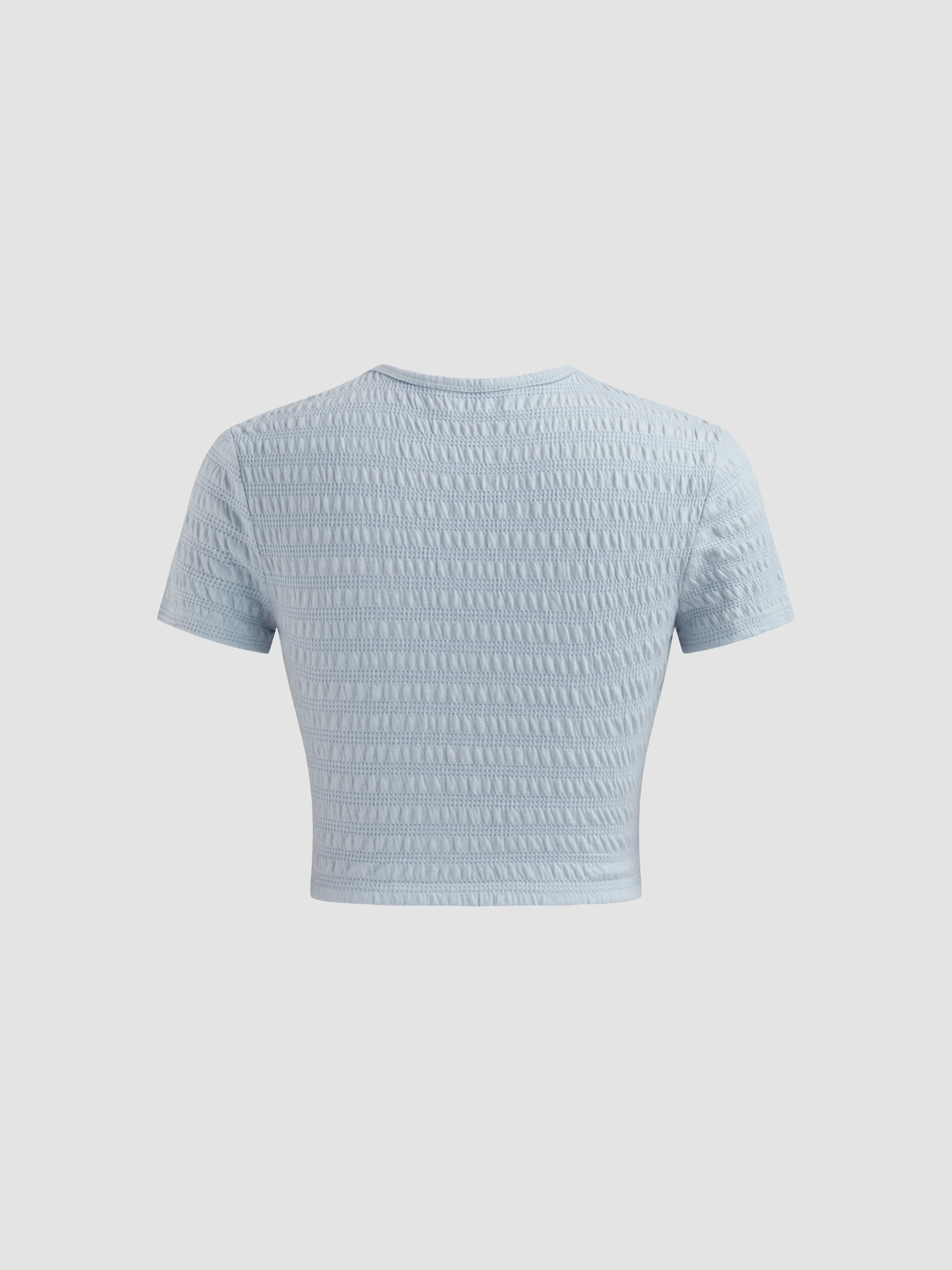 Camiseta corta de manga corta con textura sólida y cuello redondo de mezcla de algodón