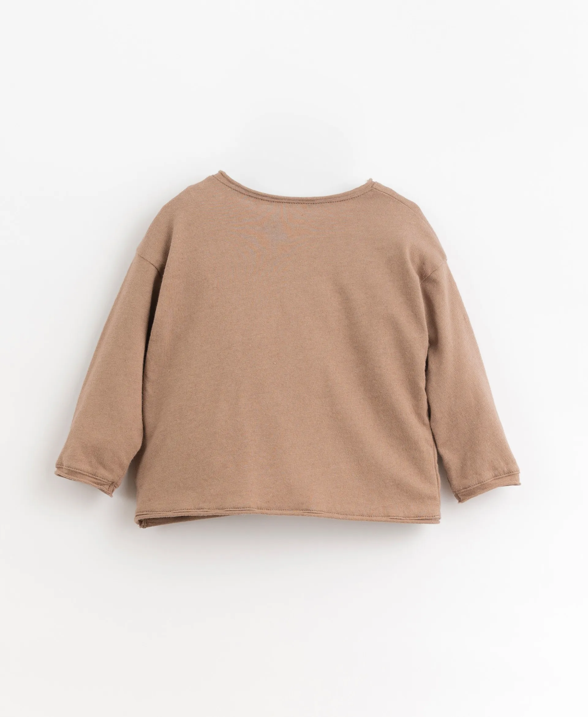 Camiseta de manga larga con frase en el bolsillo | Organic Care