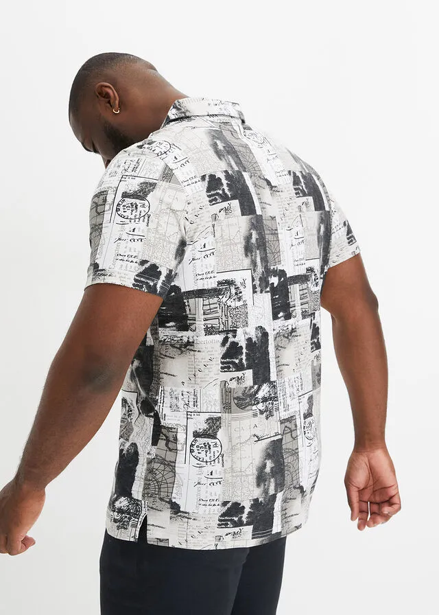 CAMISETA DE TIPO POLO BLANCOGRIS