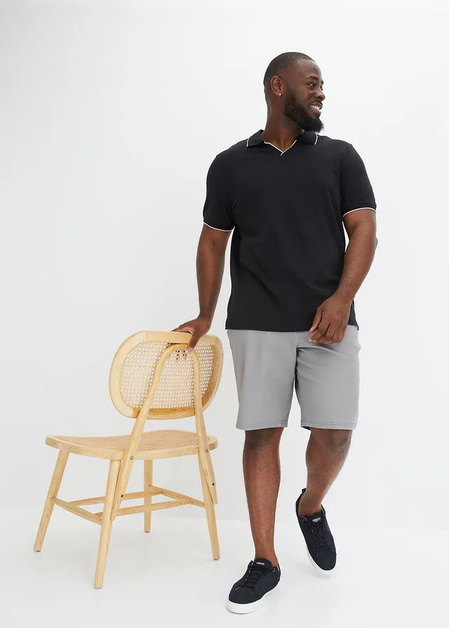 CAMISETA DE TIPO POLO NEGROBLANCO