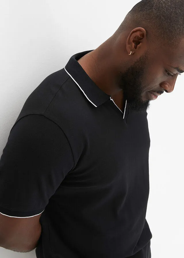 CAMISETA DE TIPO POLO NEGROBLANCO