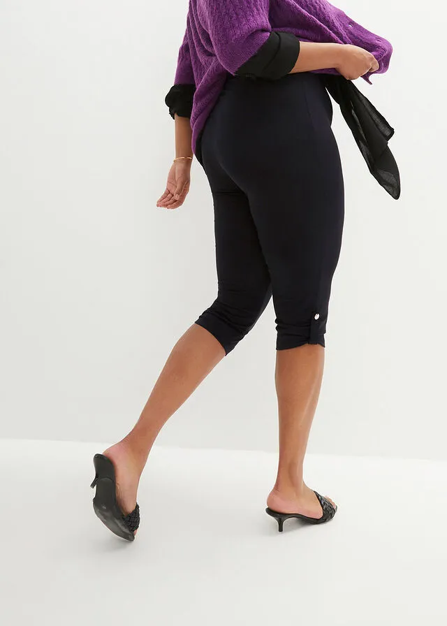 Leggings capri con botón Negro