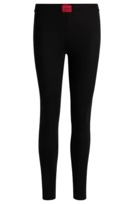 Leggings térmicos con etiqueta con logo roja