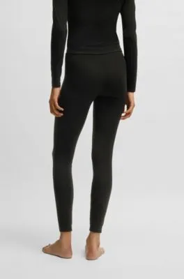 Leggings térmicos con etiqueta con logo roja