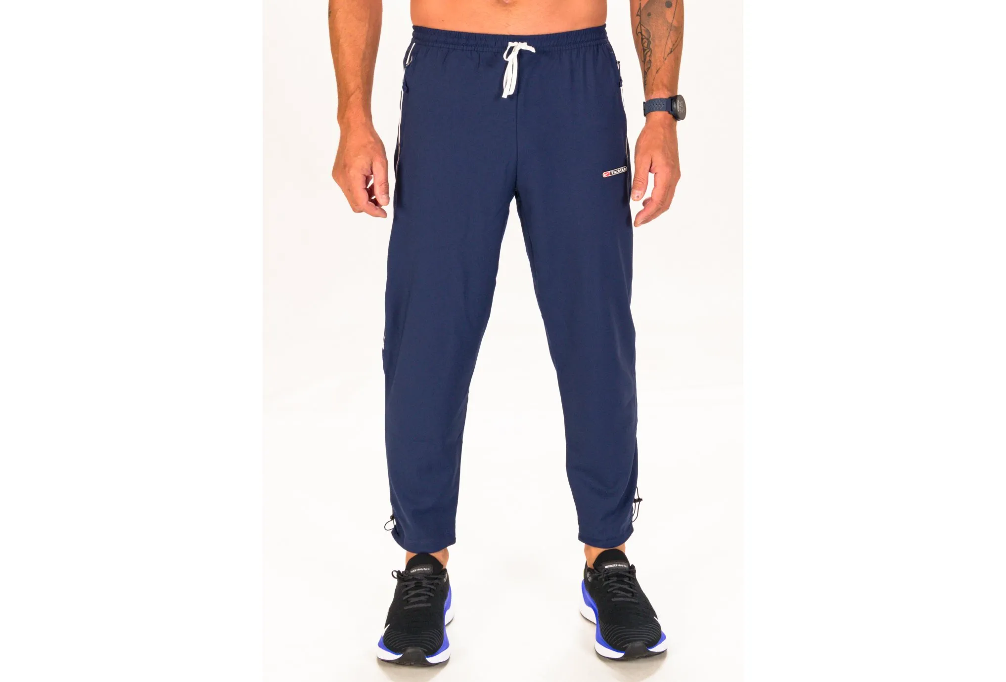 Nike pantalón Challenger Track Club