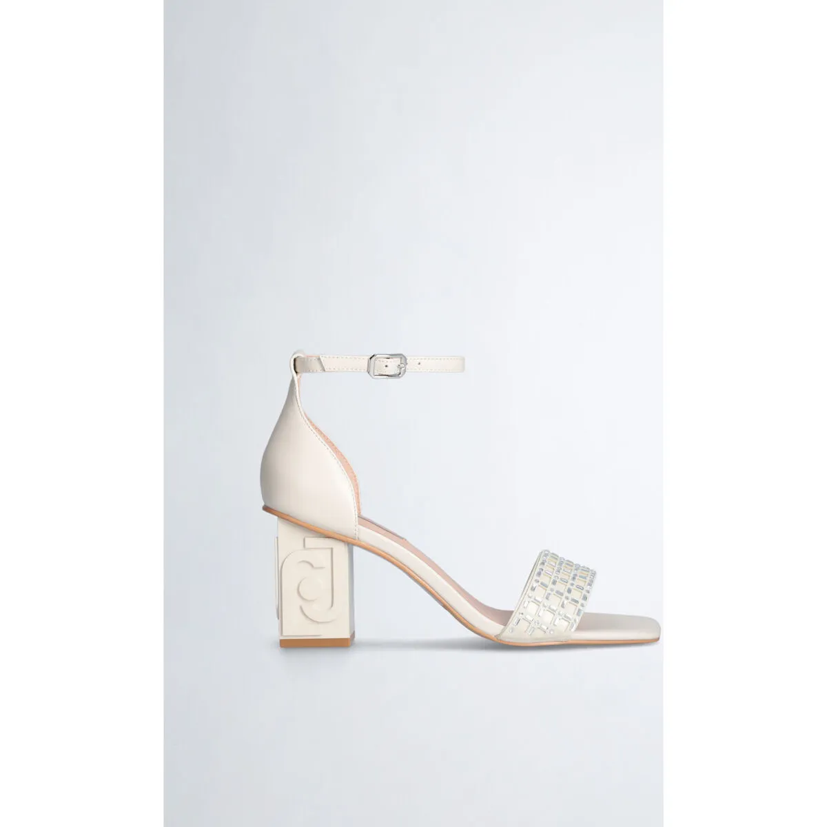 Sandalias blancas con tira decorativa