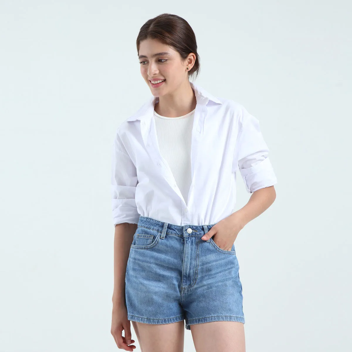 Short En Denim Con Desgastes