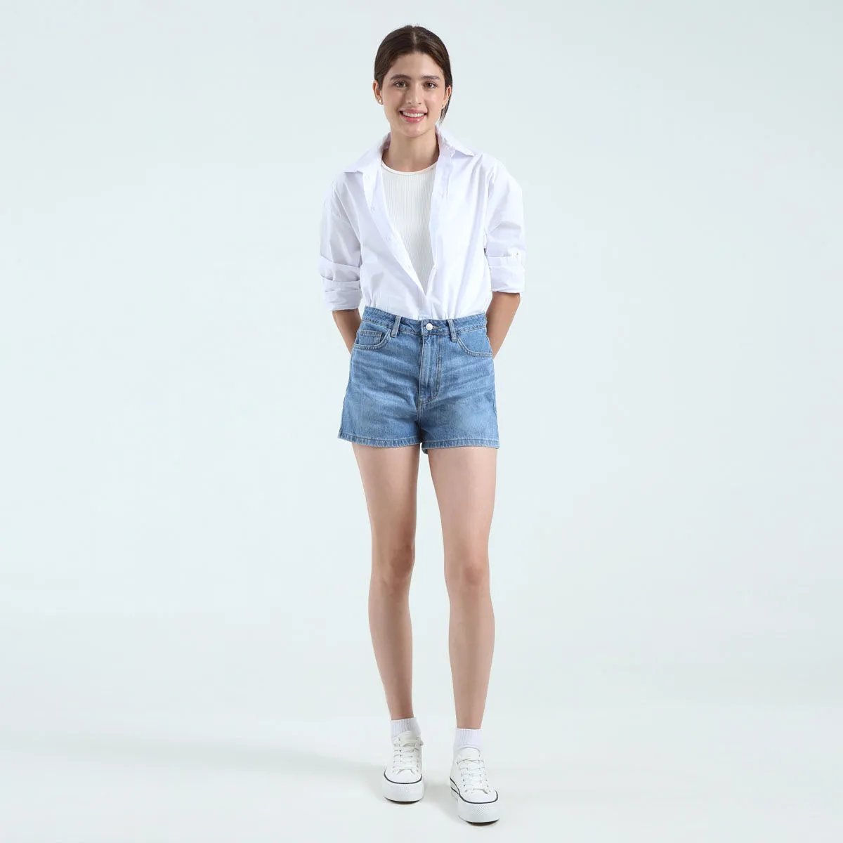 Short En Denim Con Desgastes