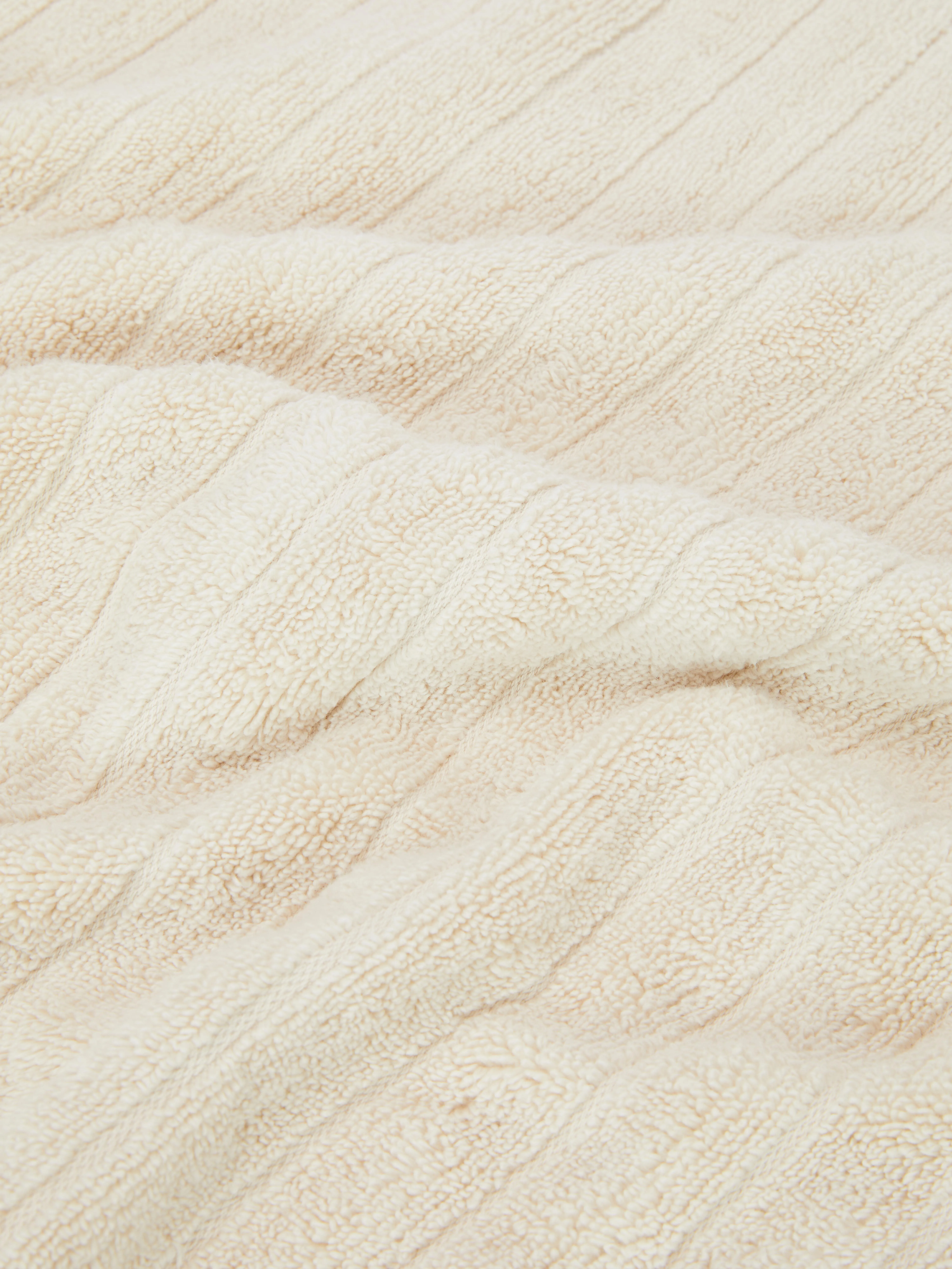 Toalla de baño acanalada con textura